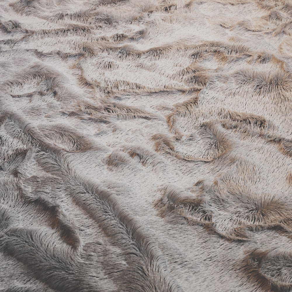 Strukturierte Felloberfläche in Weiß.